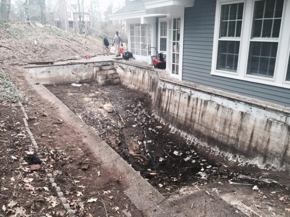 Before photo of pool installation and cleaning