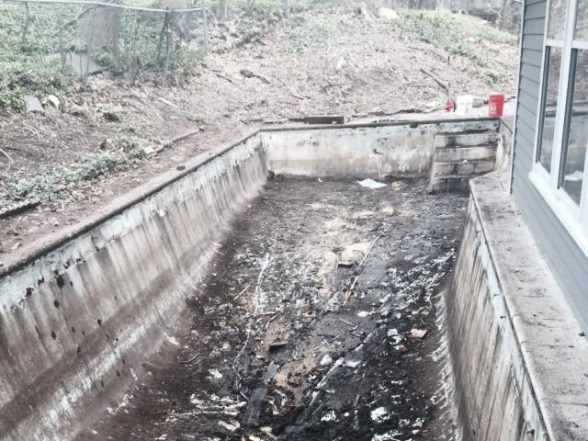 Before photo of pool installation and cleaning